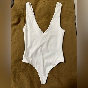 White Aritzia Babaton Contour V-Neck Bodysuit
